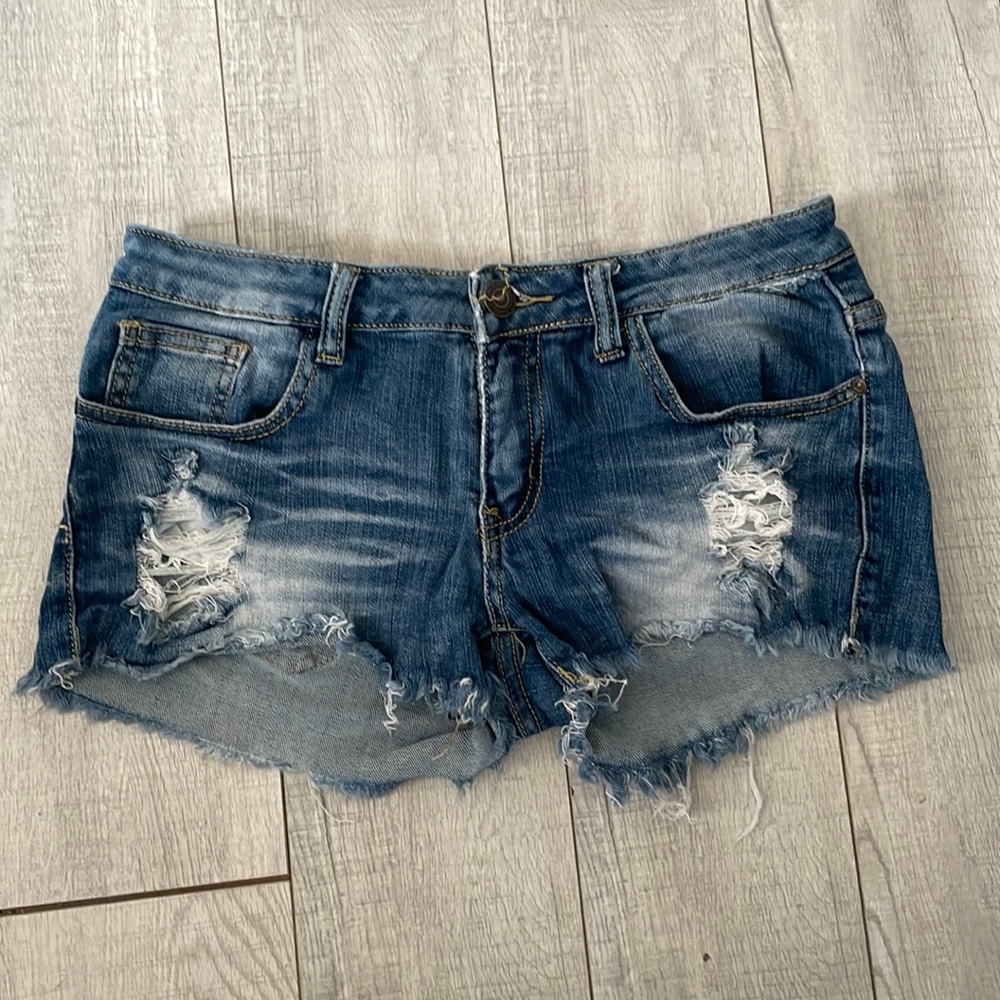 Short ripped shorts